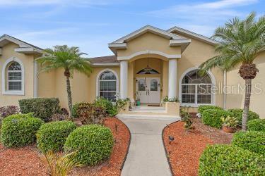 18011 Prairie Wolf Gln, Parrish, FL 34219 - entrance to property with stucco siding