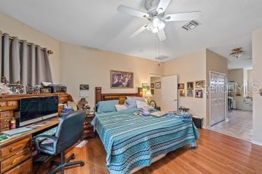 18011 Prairie Wolf Gln, Parrish, FL 34219 - bedroom featuring visible vents and wood finished floors