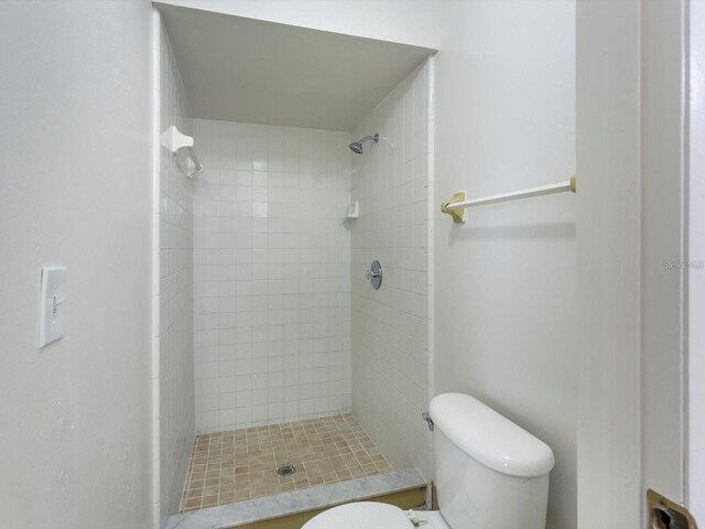 12513 Indiana Woods Ln, Orlando, FL 32824 - full bathroom with a stall shower and toilet