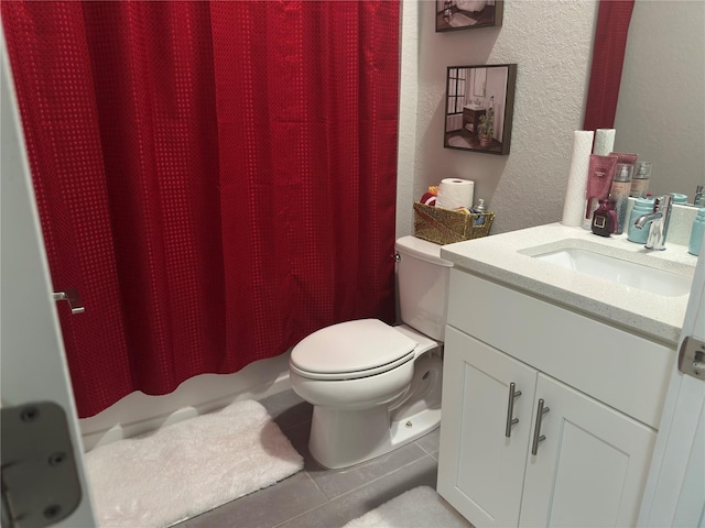 1804 Hudson Ct, Poinciana, FL 34759 - full bath featuring tile patterned flooring, vanity, and toilet