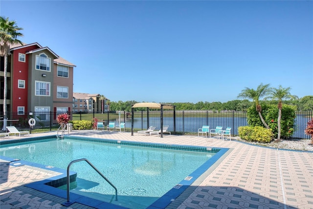 4105 Tropical Isle Blvd Unit 231, Kissimmee, FL 34741 - community pool featuring a patio area and fence