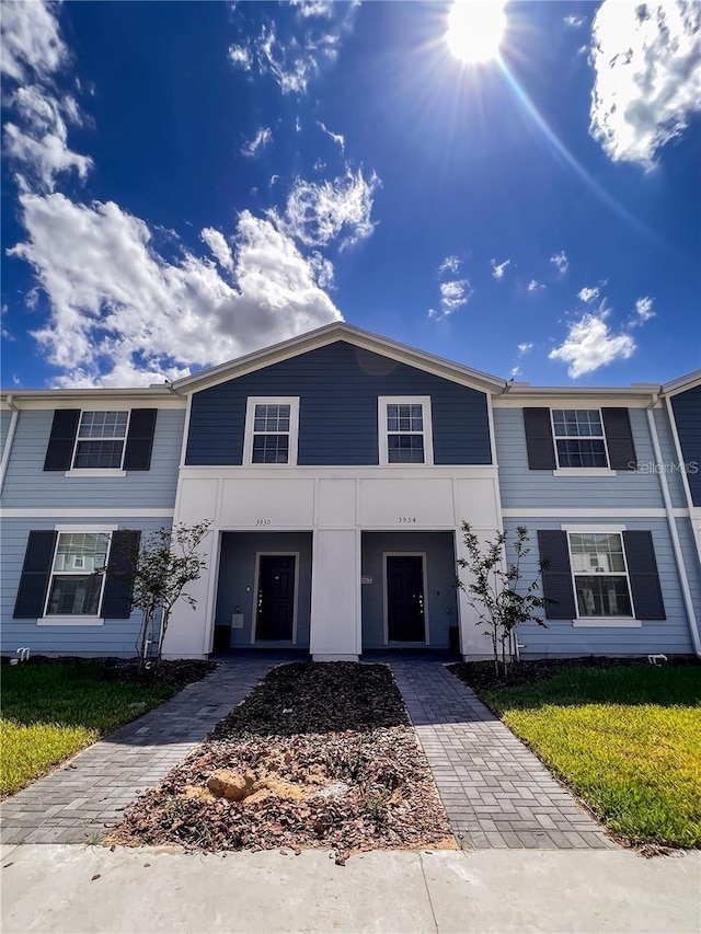 3834 Lana Ave, Davenport, FL 33897 - view of property with a front lawn