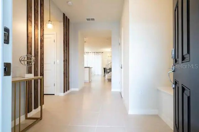 3834 Lana Ave, Davenport, FL 33897 - corridor featuring baseboards and visible vents