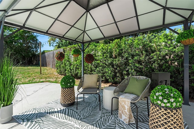 view of patio / terrace with a gazebo and fence