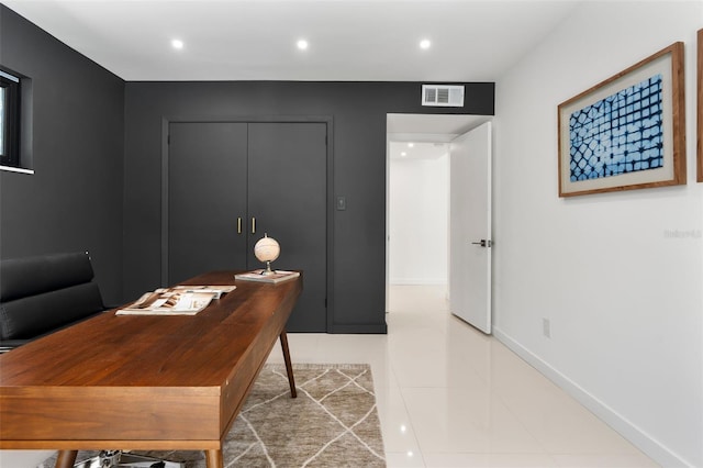 office featuring tile patterned floors, visible vents, and recessed lighting
