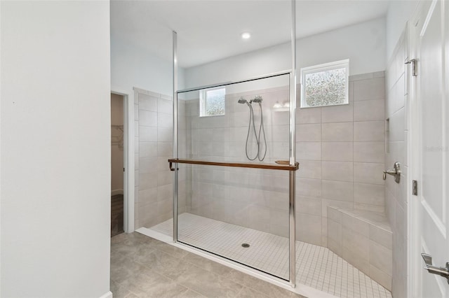 204 Bella Cortina Dr, Kissimmee, FL 34759 - full bath with a shower stall, a spacious closet, and tile patterned floors