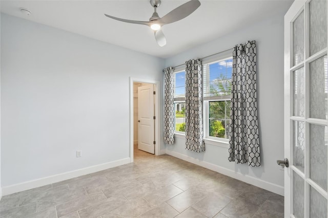 204 Bella Cortina Dr, Kissimmee, FL 34759 - unfurnished room featuring a ceiling fan and baseboards