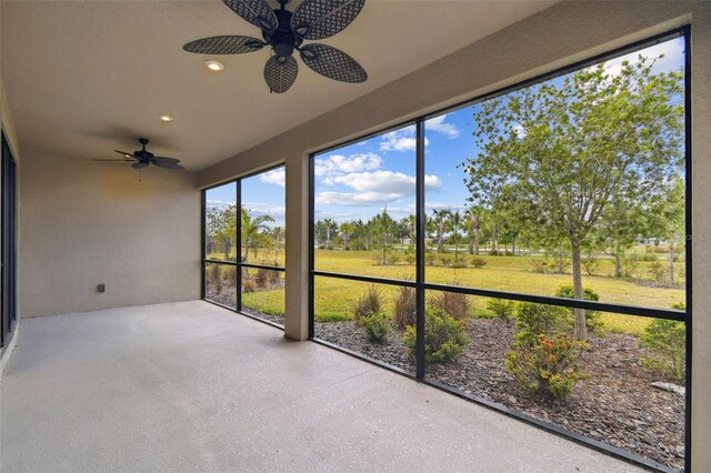 204 Bella Cortina Dr, Kissimmee, FL 34759 - unfurnished sunroom featuring a ceiling fan