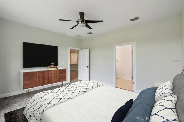 204 Bella Cortina Dr, Kissimmee, FL 34759 - bedroom with light carpet, baseboards, and ceiling fan
