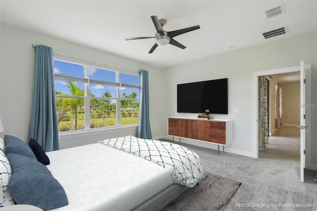 204 Bella Cortina Dr, Kissimmee, FL 34759 - carpeted bedroom with baseboards and a ceiling fan
