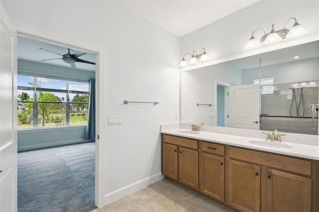 204 Bella Cortina Dr, Kissimmee, FL 34759 - full bath featuring plenty of natural light, baseboards, double vanity, and a tile shower