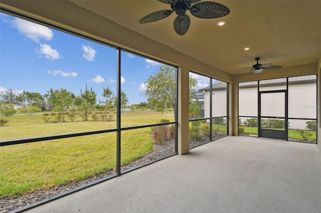 204 Bella Cortina Dr, Kissimmee, FL 34759 - unfurnished sunroom with a ceiling fan