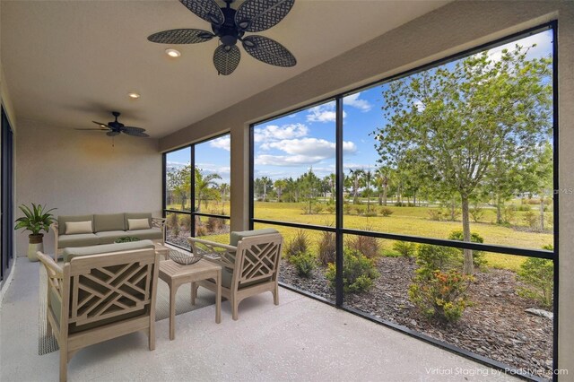 204 Bella Cortina Dr, Kissimmee, FL 34759 - sunroom featuring ceiling fan and an outdoor hangout area