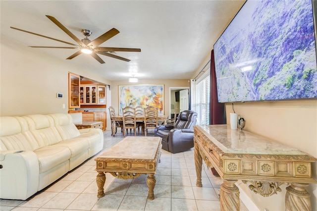 245 Le Jeune Dr, Merritt Island, FL 32953 - living area with ceiling fan and light tile patterned flooring