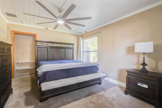 245 Le Jeune Dr, Merritt Island, FL 32953 - carpeted bedroom featuring visible vents, ornamental molding, baseboards, wood ceiling, and ceiling fan