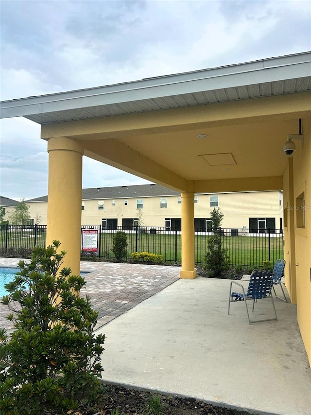 4871 Coral Castle Dr, Kissimmee, FL 34746 - view of patio / terrace with fence