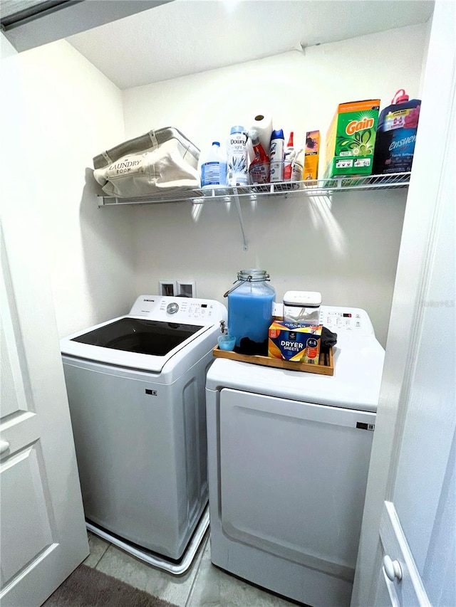4871 Coral Castle Dr, Kissimmee, FL 34746 - washroom featuring tile patterned floors, laundry area, and independent washer and dryer