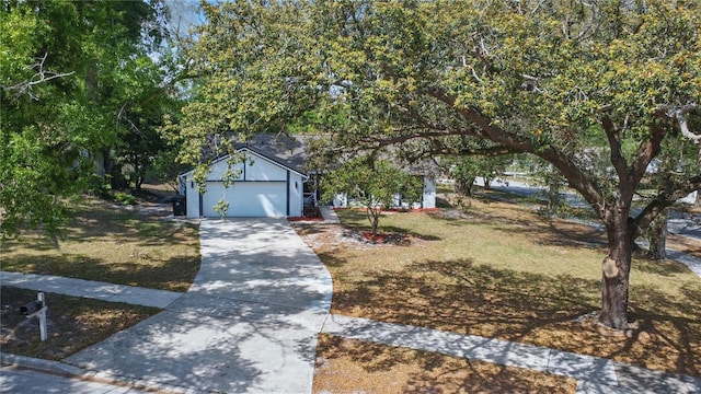 view of front of house with concrete driveway