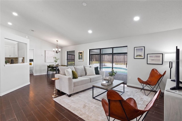 living area featuring a chandelier, dark wood finished floors, vaulted ceiling, and recessed lighting