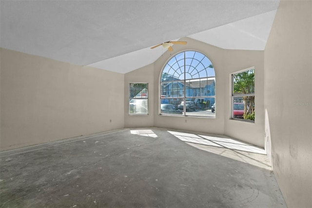 2745 N Poinciana Blvd Unit 65, Kissimmee, FL 34746 - empty room with concrete flooring, a ceiling fan, and lofted ceiling