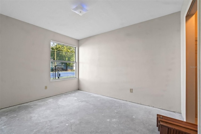 2745 N Poinciana Blvd Unit 65, Kissimmee, FL 34746 - unfurnished room featuring unfinished concrete floors