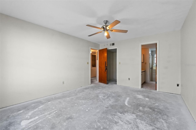 2745 N Poinciana Blvd Unit 65, Kissimmee, FL 34746 - unfurnished bedroom with concrete flooring, a ceiling fan, visible vents, and connected bathroom