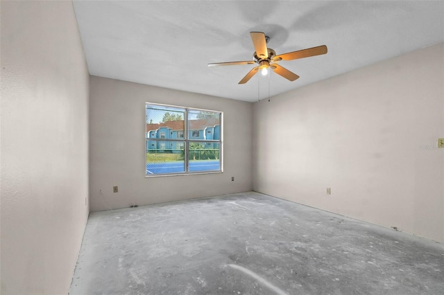2745 N Poinciana Blvd Unit 65, Kissimmee, FL 34746 - empty room featuring unfinished concrete floors and a ceiling fan