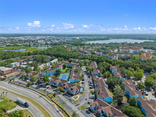 2745 N Poinciana Blvd Unit 65, Kissimmee, FL 34746 - drone / aerial view with a water view and a residential view