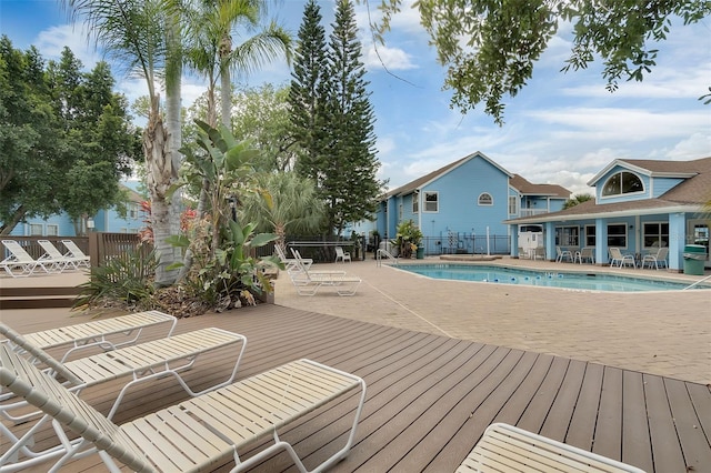 2745 N Poinciana Blvd Unit 65, Kissimmee, FL 34746 - community pool featuring fence and a patio