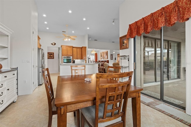 469 Sorrento Rd, Kissimmee, FL 34759 - dining space with light tile patterned floors, ceiling fan, recessed lighting, and a high ceiling