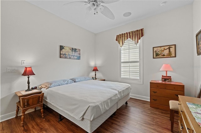 469 Sorrento Rd, Kissimmee, FL 34759 - bedroom featuring wood finished floors, ceiling fan, and baseboards