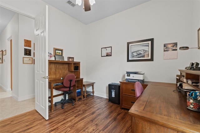 469 Sorrento Rd, Kissimmee, FL 34759 - office area with visible vents, baseboards, a ceiling fan, and wood finished floors