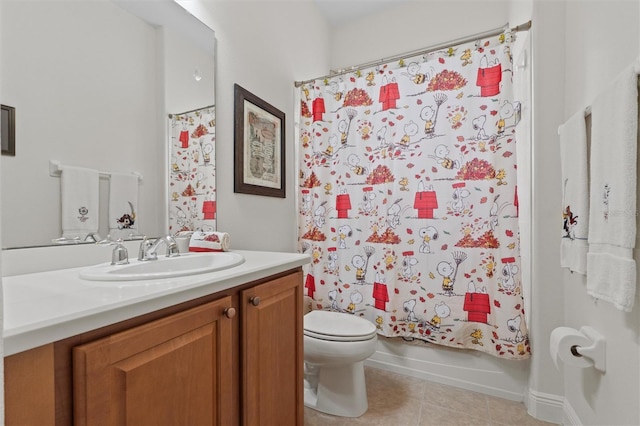 469 Sorrento Rd, Kissimmee, FL 34759 - full bathroom featuring toilet, shower / tub combo, vanity, and tile patterned flooring