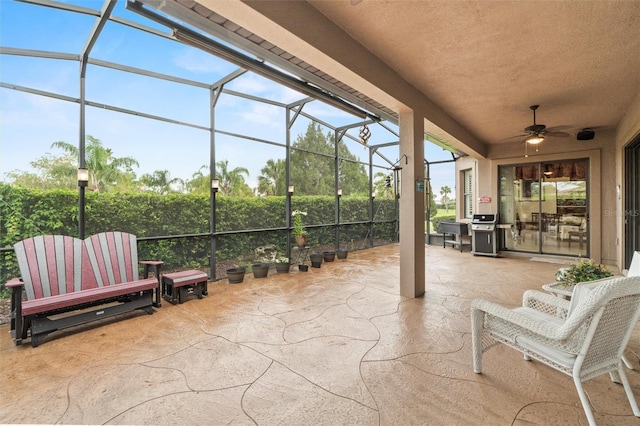 469 Sorrento Rd, Kissimmee, FL 34759 - view of patio with grilling area, glass enclosure, and a ceiling fan