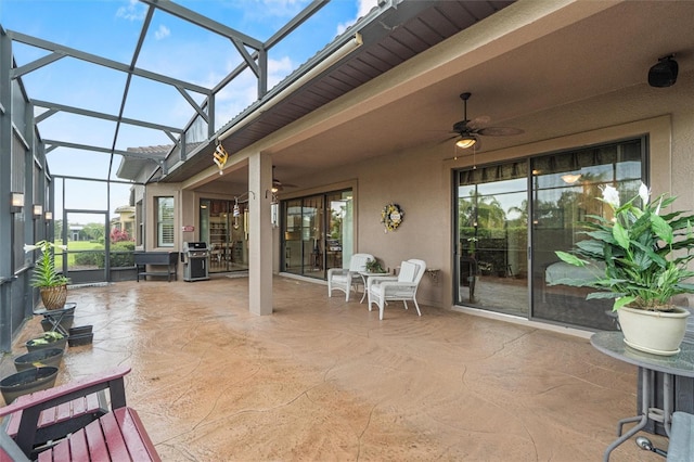 469 Sorrento Rd, Kissimmee, FL 34759 - view of patio featuring grilling area, ceiling fan, and a lanai