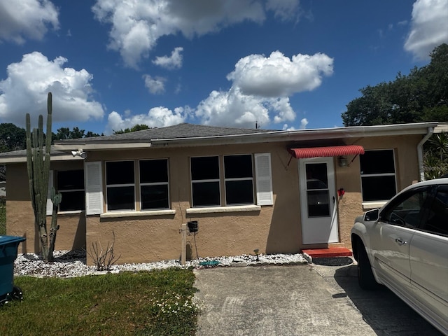 view of front of home featuring stucco siding