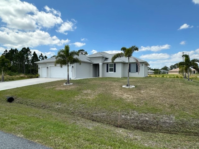 single story home with concrete driveway, a front lawn, stucco siding, and an attached garage