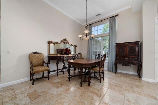 9509 Baycliff Ct, Orlando, FL 32836 - dining space featuring stone tile floors, crown molding, a chandelier, and baseboards