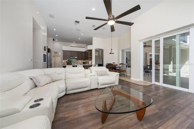 9509 Baycliff Ct, Orlando, FL 32836 - living room featuring ceiling fan, wood finished floors, a high ceiling, and recessed lighting