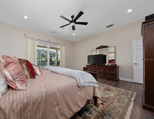 9509 Baycliff Ct, Orlando, FL 32836 - bedroom featuring dark wood-type flooring, ceiling fan, recessed lighting, and baseboards
