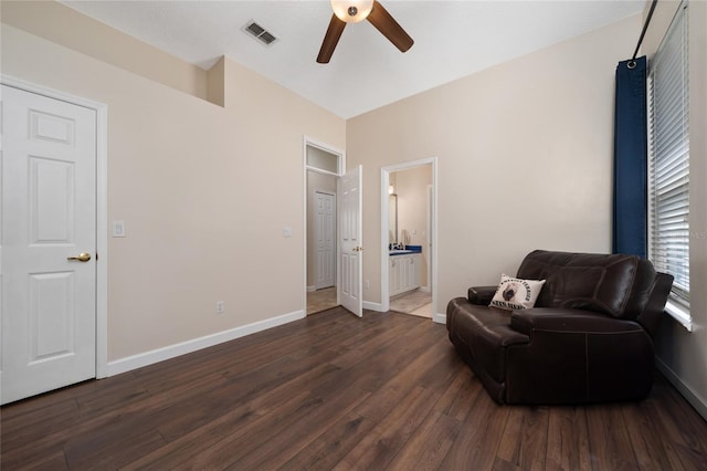 9509 Baycliff Ct, Orlando, FL 32836 - living area with ceiling fan, dark wood finished floors, and baseboards