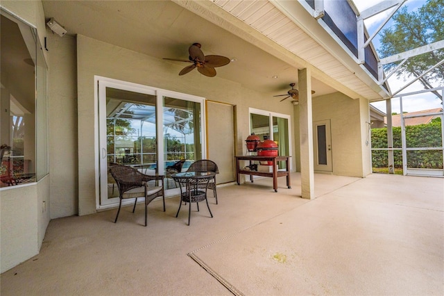 9509 Baycliff Ct, Orlando, FL 32836 - view of patio / terrace with ceiling fan and glass enclosure