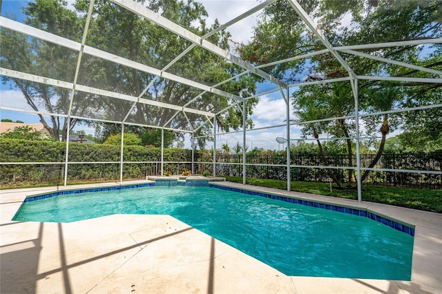 9509 Baycliff Ct, Orlando, FL 32836 - view of swimming pool with an in-ground hot tub, a patio area, a fenced backyard, and a lanai