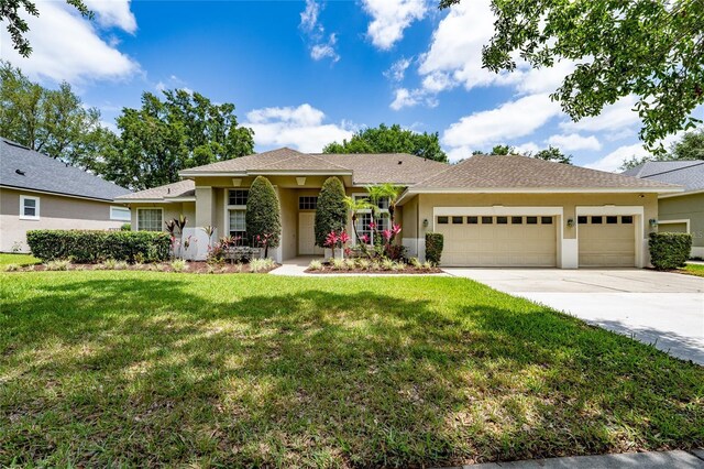 9509 Baycliff Ct, Orlando, FL 32836 - single story home with an attached garage, stucco siding, concrete driveway, and a front yard