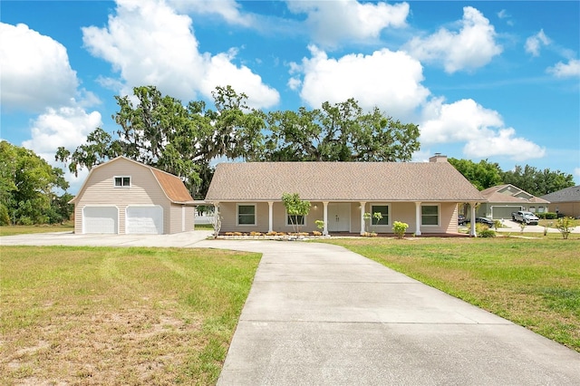 7938 Riffle Ln, Orlando, FL 32818 - ranch-style house with a porch, an outbuilding, a garage, and a front yard