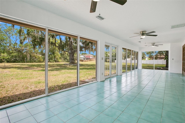 7938 Riffle Ln, Orlando, FL 32818 - unfurnished sunroom featuring ceiling fan