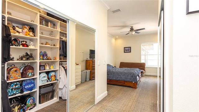 2734 Eagle Lake Dr, Orlando, FL 32837 - bedroom featuring visible vents, a ceiling fan, carpet floors, crown molding, and baseboards