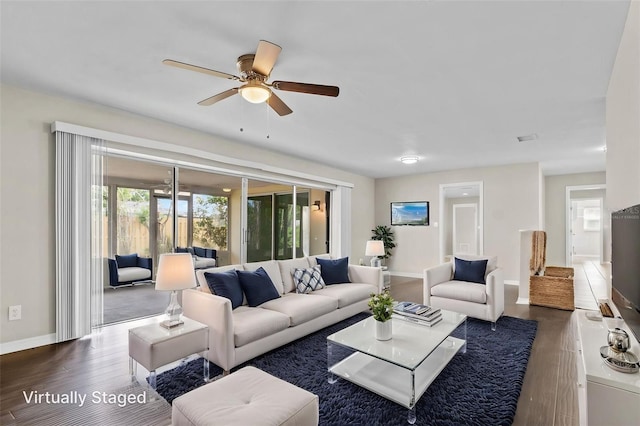 14010 102nd Ave, Largo, FL 33774 - living area featuring wood finished floors, baseboards, and a wealth of natural light