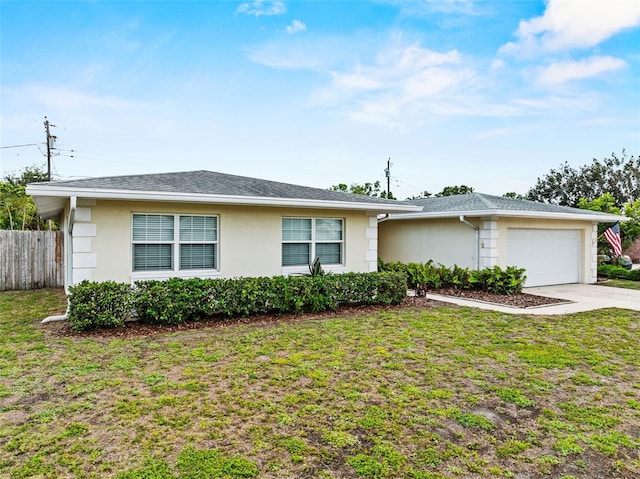 14010 102nd Ave, Largo, FL 33774 - ranch-style house featuring stucco siding, fence, a front lawn, an attached garage, and concrete driveway
