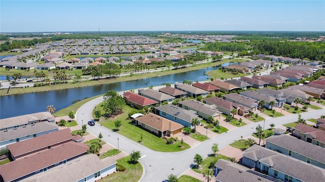 328 Vestrella Dr, Poinciana, FL 34759 - drone / aerial view featuring a water view and a residential view